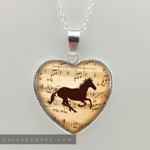 running musical horse heart necklace