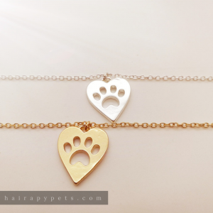 paw print cut out bracelet gold and silver